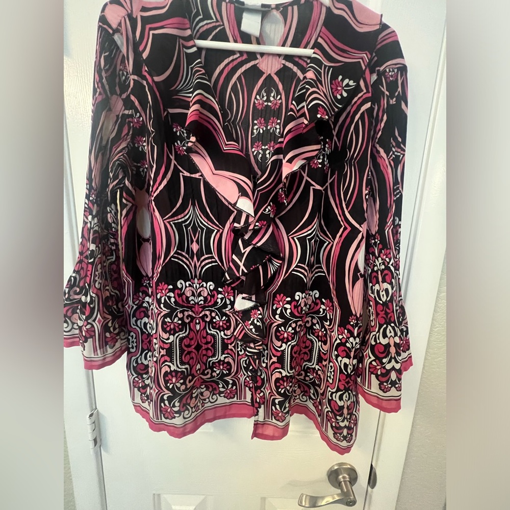 Beautiful Blouse. Hangs so nice and very flattering. EUC non smoking house